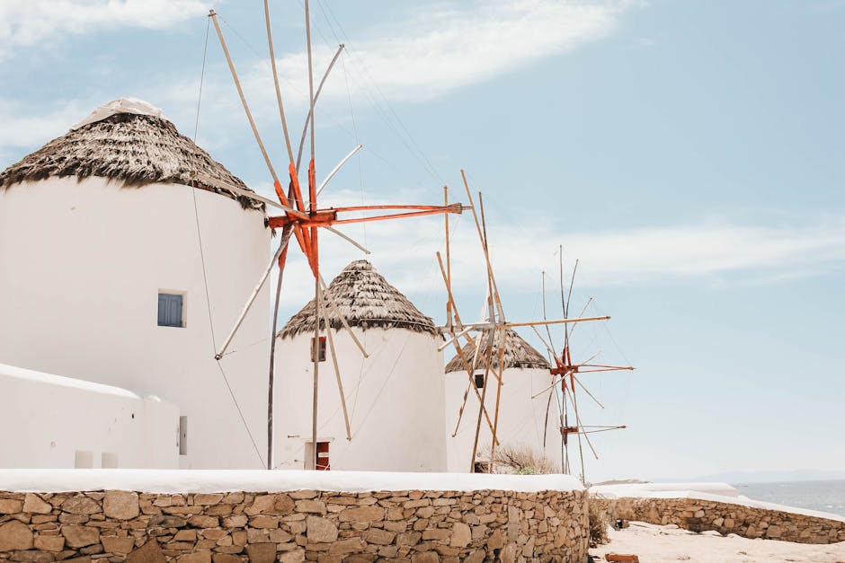 Mykonos Dome Villas With White Walls and Sea Arches